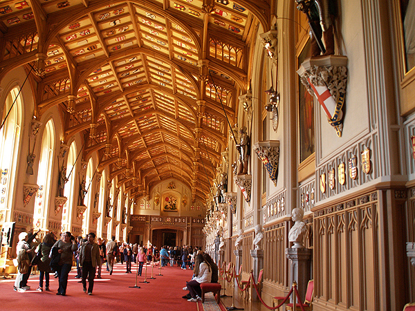 St George's Hall at Windsor Castle had to be rebuilt after the fire of 1992. Its ceiling features a ceiling studded with the coats of arms of every single Knight of the Garter since the order was founded in 1348. Credit: Joshua Barnett, CC BY 2.0, via Wikimedia Commons.
